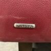 NATUZZI Dark Red Leather Loveseat