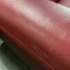 NATUZZI Dark Red Leather Loveseat