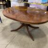 Amber Toned Metal Foot Pedestal Table