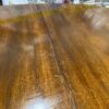 Amber Toned Metal Foot Pedestal Table