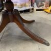 Amber Toned Metal Foot Pedestal Table