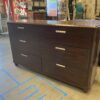 CORT Red Toned 6 Drawer Silver Pull Dresser