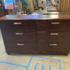 CORT Red Toned 6 Drawer Silver Pull Dresser