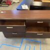 CORT Red Toned 6 Drawer Silver Pull Dresser