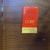 CORT Red Toned 6 Drawer Silver Pull Dresser