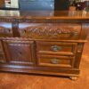 MAGNOLIA CLASSICS Dark Wood Dresser with Ornate Carvings and Center Cabinet