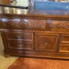 MAGNOLIA CLASSICS Dark Wood Dresser with Ornate Carvings and Center Cabinet