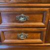 MAGNOLIA CLASSICS Dark Wood Dresser with Ornate Carvings and Center Cabinet