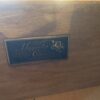 MAGNOLIA CLASSICS Dark Wood Dresser with Ornate Carvings and Center Cabinet
