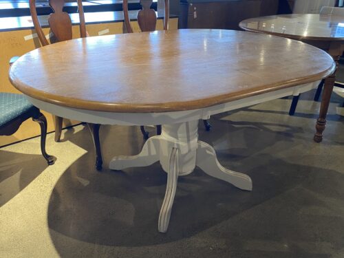 Well-Loved 2-Tone Oval Pedestal Dining Table