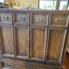 Tall Dresser with Recessed Panel Fronts and Brass Pulls