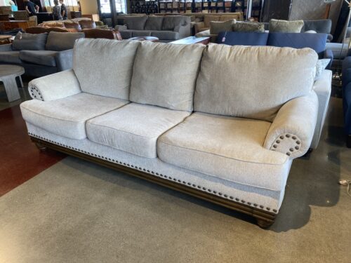 Three Seater Couch with Nailhead Detail and Wood Legs