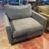 Oversized Dark Grey Upholstered Chair with Accent Pillows