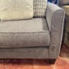Oversized Dark Grey Upholstered Chair with Accent Pillows
