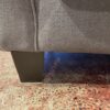 Oversized Dark Grey Upholstered Chair with Accent Pillows