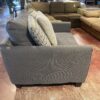 Oversized Dark Grey Upholstered Chair with Accent Pillows