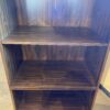 BROYHILL Illuminated Cabinet with Carved Detail Top Trim