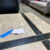 White Faux Marble End Table with Black Cross Inlay