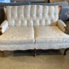 French Provincial Tufted Loveseat with Wood Trim