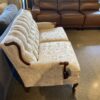 French Provincial Tufted Loveseat with Wood Trim