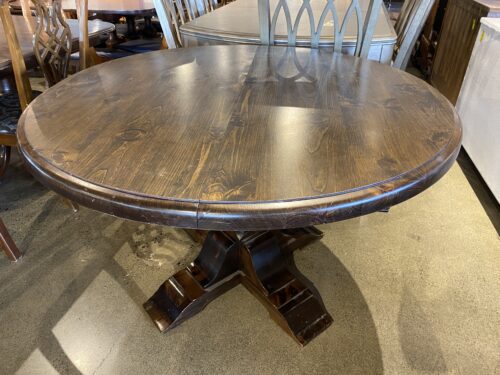 Round Dining Table with a Pedestal Base
