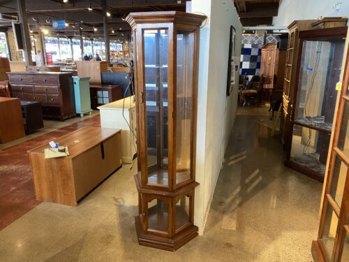 Trapezoid Shaped Curio Cabinet with Mirrored Backdrop