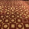Red Club Chair with Circle and Square Pattern