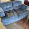 Charcoal Grey Loveseat with Tufted Cushions