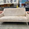 Light Tan Highbacked Slope Armed Sofa
