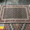 Ornate Red & Black Rug