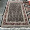 Ornate Red & Black Rug