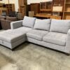 WORLD MARKET Light Grey Tufted L Sectional with Stoarge Chaise