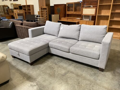 WORLD MARKET Light Grey Tufted L Sectional with Stoarge Chaise