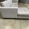 WORLD MARKET Light Grey Tufted L Sectional with Stoarge Chaise