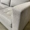 WORLD MARKET Light Grey Tufted L Sectional with Stoarge Chaise