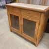 Vintage Gold Muntined Cabinet with Travertine Top