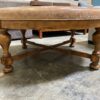 Large Round Leather Ottoman with Colonial Style Wooden Legs