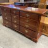 Polished Red Wood and Brass 9 Drawer Dresser