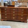 Polished Red Wood and Brass 9 Drawer Dresser