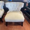Cream Colored Tufted Chair with Nailhead Detail