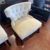 Cream Colored Tufted Chair with Nailhead Detail