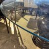 Round Glass Top Dining Table with a Hourglass Pedestal Base