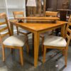 BASSETT Wooden Dining Set w/ 4 Chairs & Leaf
