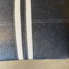 Black Futon with White Stripe Accents
