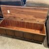 LANE Cedar Chest with Black Tufted Top and Casters Wheels