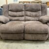 Brown Upholstered Manual Reclining Loveseat