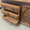 Carved Wood Dresser with 9 Drawers