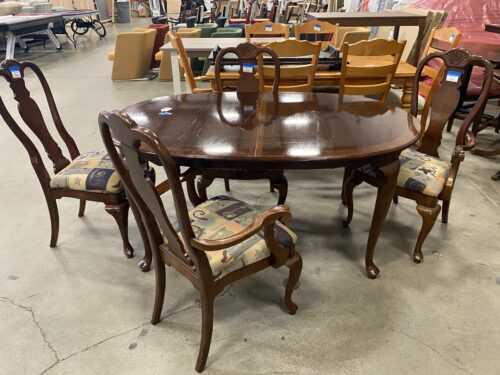Dark Stained Oval Claw Foot Dining Table with 4 Chairs and 2 Leaf Extensions