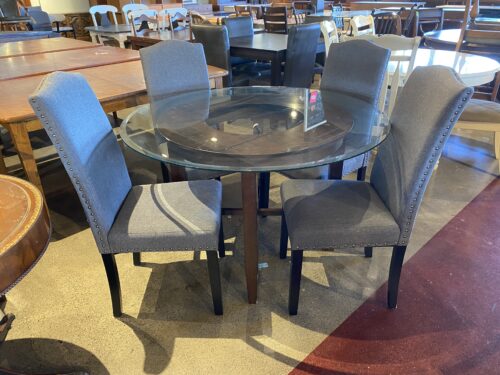 48" Circular Glass Top Dining Table with 4 Grey Upholstered Chairs