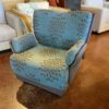 Blue Rolling Chair with Grey Floral Design